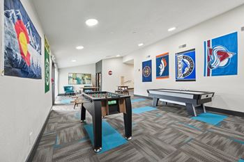 Resident social lounge with air hockey and foosball tables